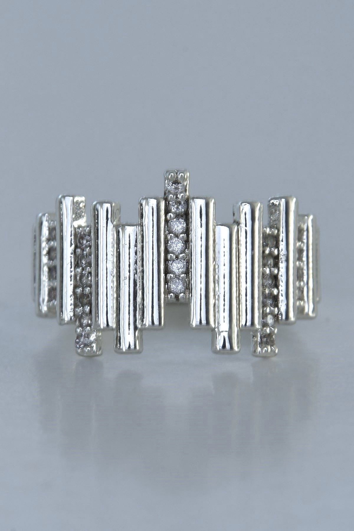 aureo-ring-sølvfarge-stal-smykke
