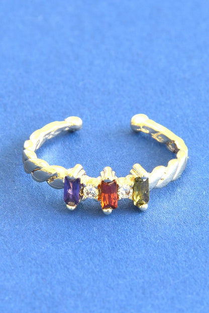  Effly-ring med tre fargerike steiner i gullfarget stål
