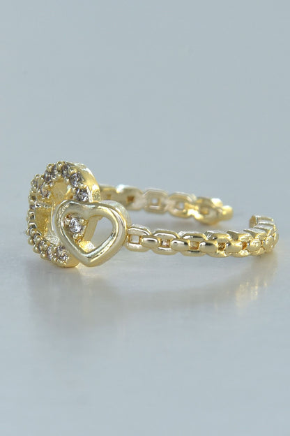 Tvillinghjerte-ring i gullfarge, laget av stål