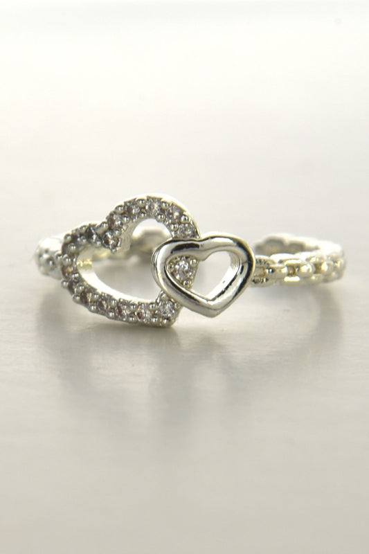 Tvillinghjerte-ring i sølvfarge, laget av stål