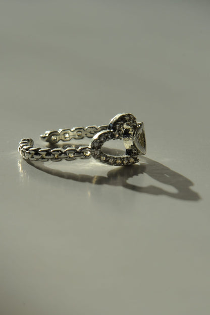 Tvillinghjerte-ring i sølvfarge, laget av stål